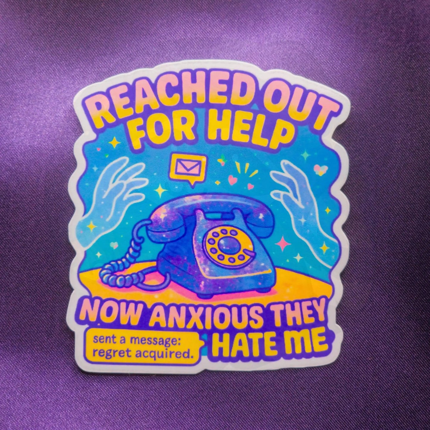 A colorful sticker on a purple background features the text "Reached out for help, now anxious they hate me." Includes a vintage phone, hands, and an envelope icon. Emotes uncertainty and regret.